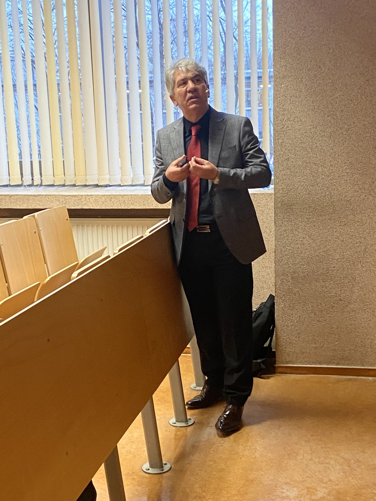 A man giving a presentation. 