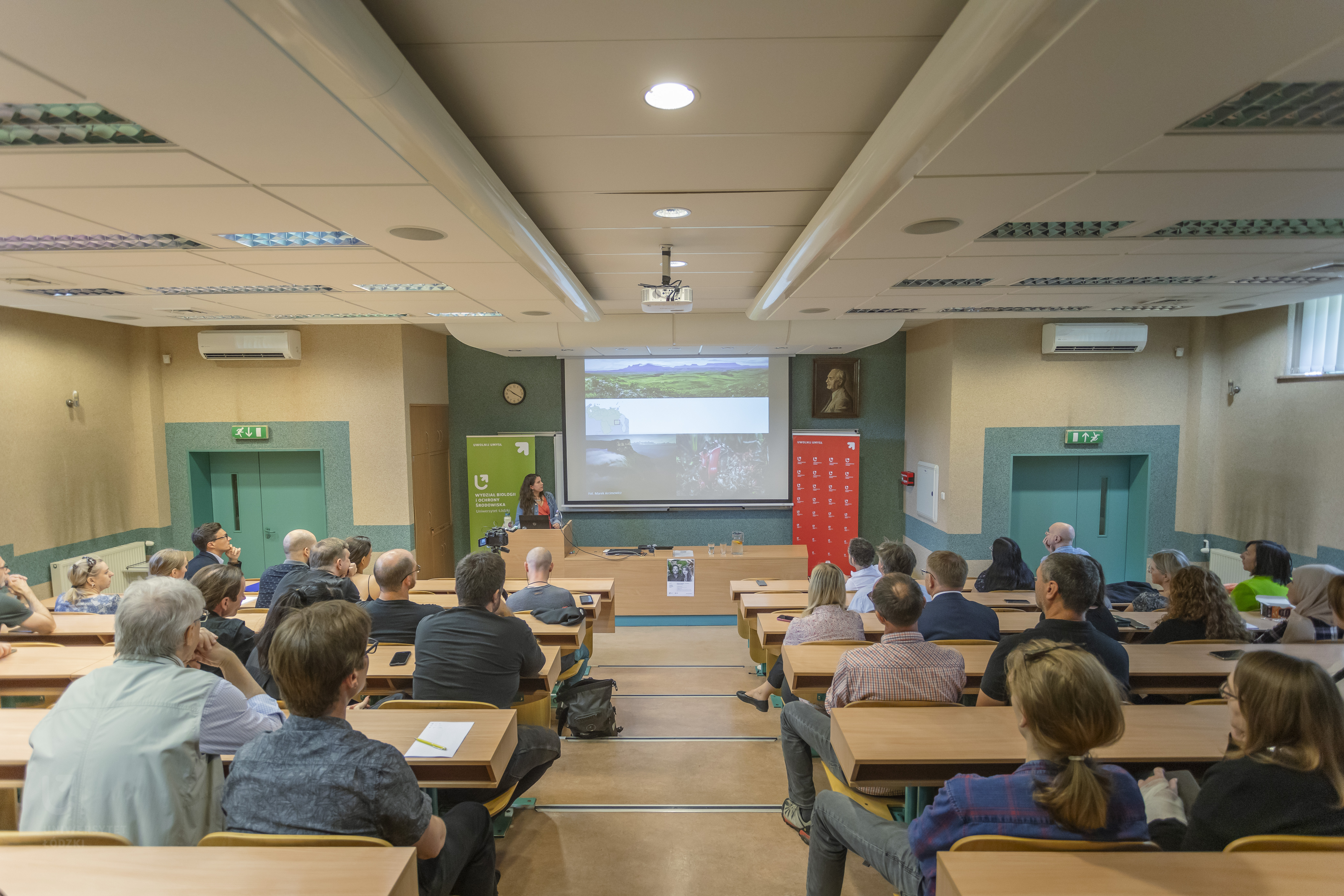 A lecture hall full of people.