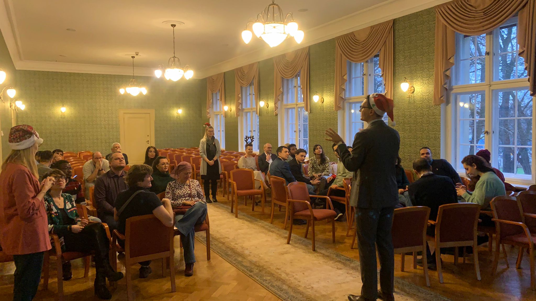 People sitting in a conference room.