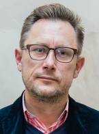 portret Grzegorz Justyński