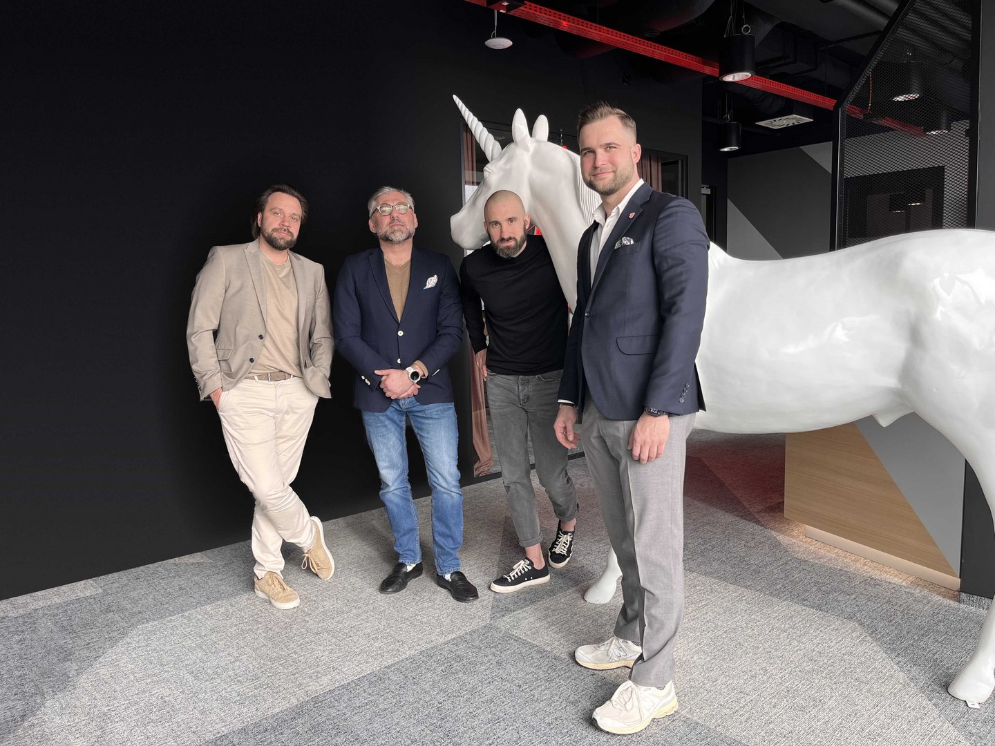 A photo of four men