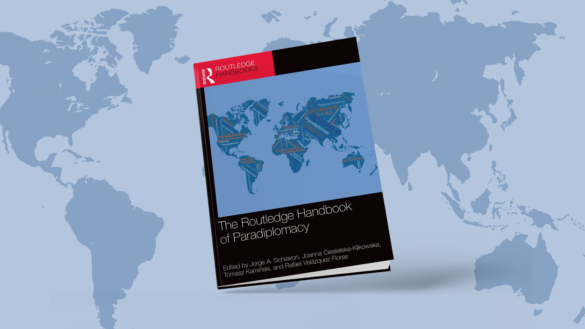cover of the publication in question against the background of a world map